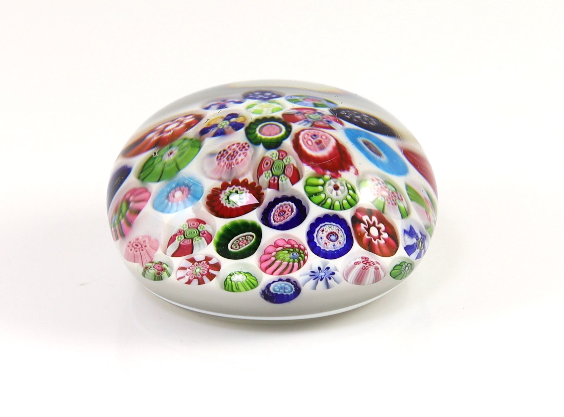 A 19th century French millefiori glass magnum paperweight, possibly Clichy, 9 cm diameter